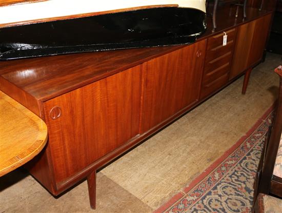 A Danish sideboard, in the manner of Arne Vodder, W.7ft 10in. D.1ft 7in. H.2ft 7in.